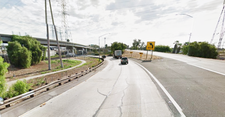 Overturned Big Rig Spills Cargo, Closing Freeway Transition Road in ...