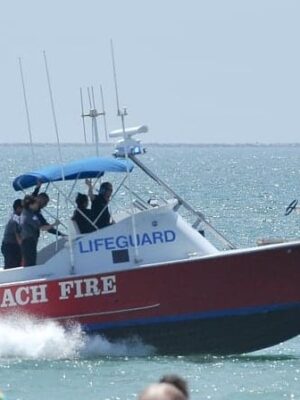 UPDATE: Missing jet skiers rescued from breakwater, hoisted from water  after overnight search