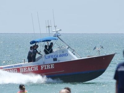 UPDATE: Missing jet skiers rescued from breakwater, hoisted from water  after overnight search