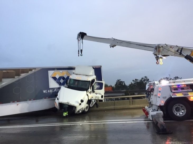 Truck crashes, hangs off 710 Freeway connector ramp in East LA • Long ...