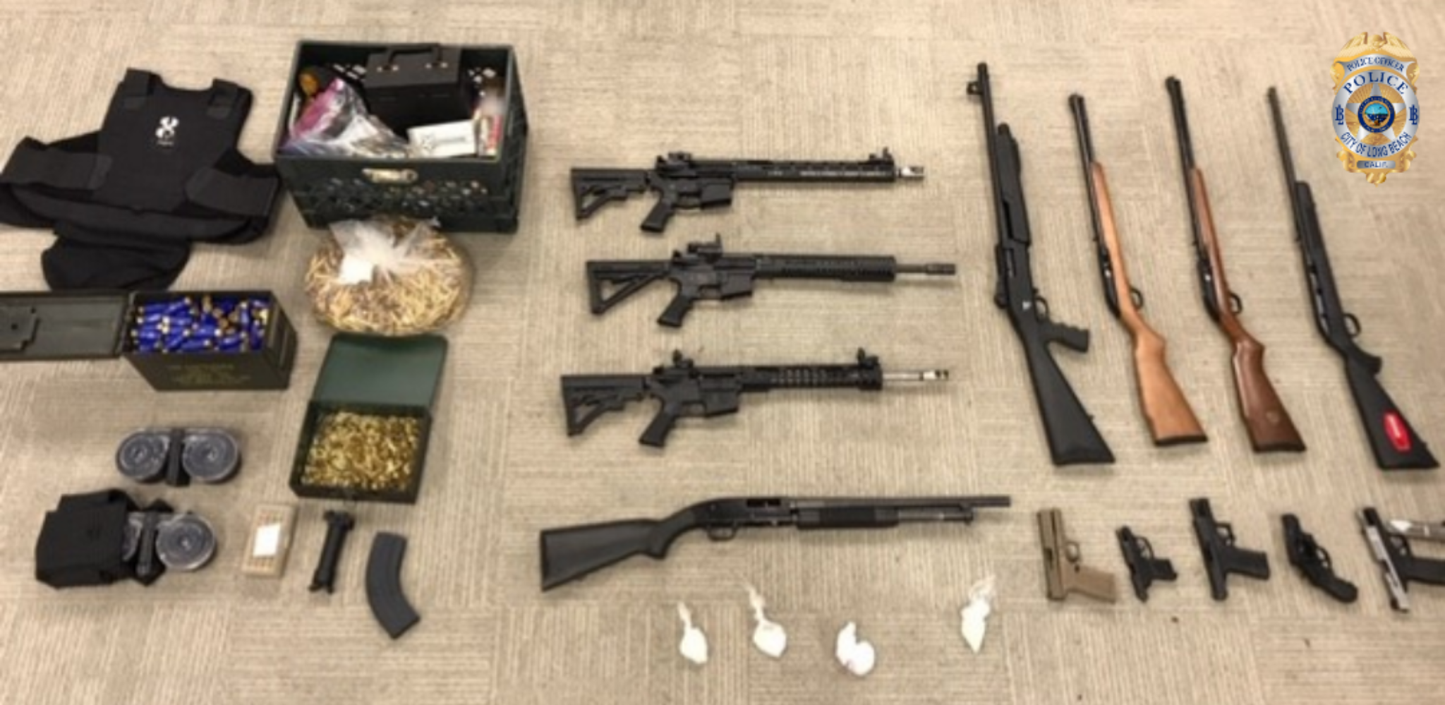 Police seize 13 guns in raid on suspected firearms dealer, Long Beach ...