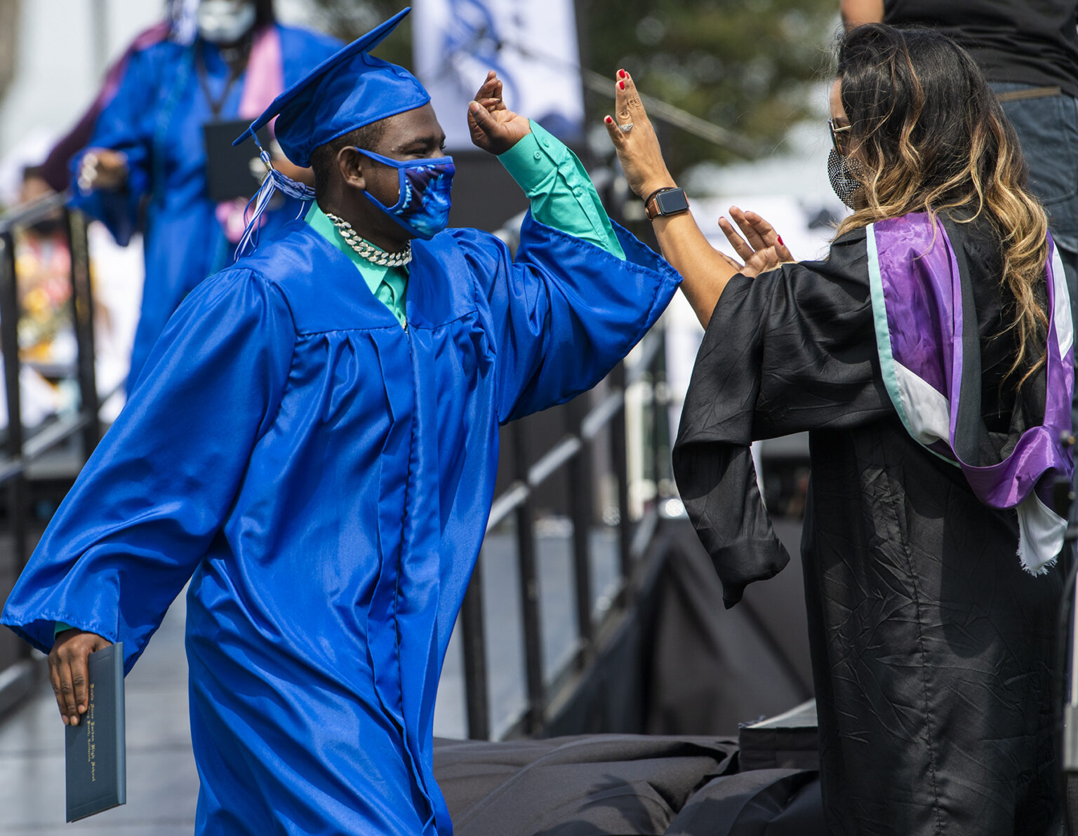 IN PICTURES More than 400 graduate from Jordan High School • Long