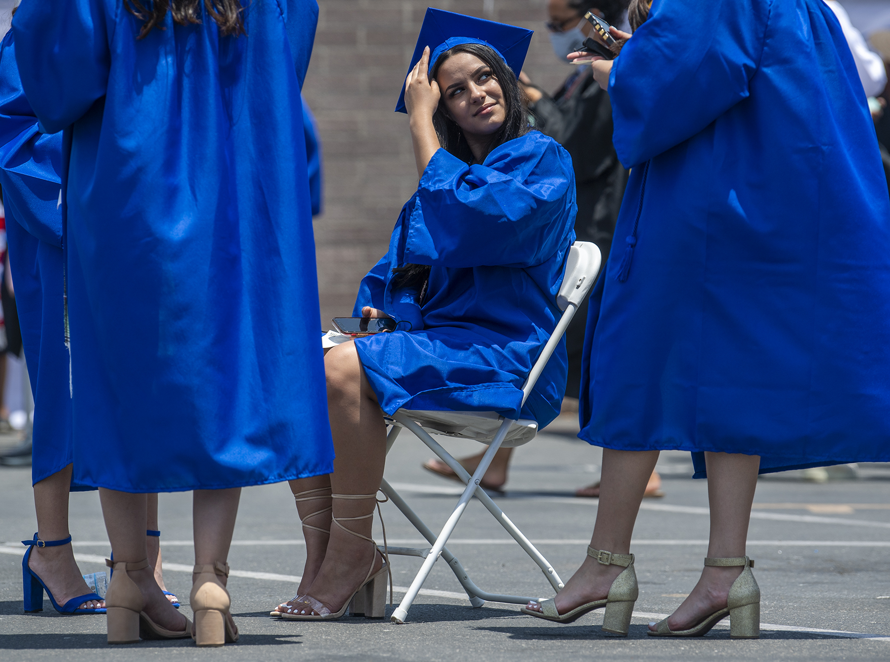 IN PICTURES More than 400 graduate from Jordan High School • Long