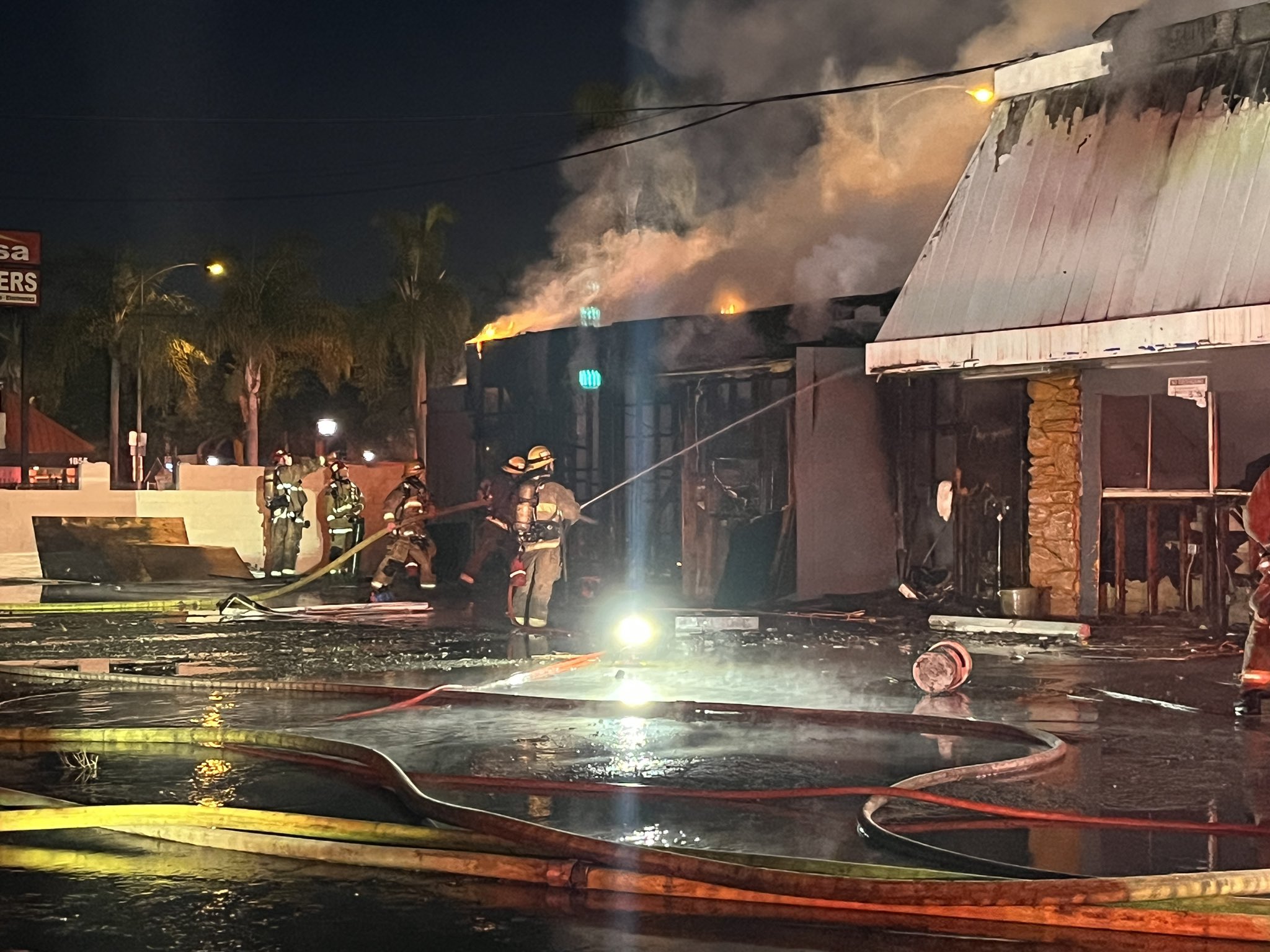 Firefighters douse 2-alarm fire at abandoned building in Washington ...