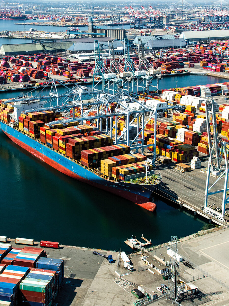 Crews at Port of Long Beach work to stabilize containers on ship that encountered rough seas