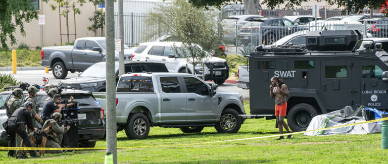 Man in tent surrenders after hours-long SWAT standoff at park ...