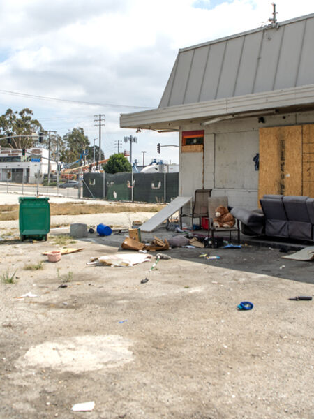 In rare step, city threatens to condemn pair of neglected North Long Beach buildings