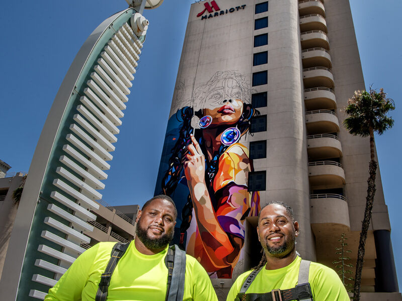 He’s painting a 12-story mural in the heart of downtown; here’s his message of encouragement