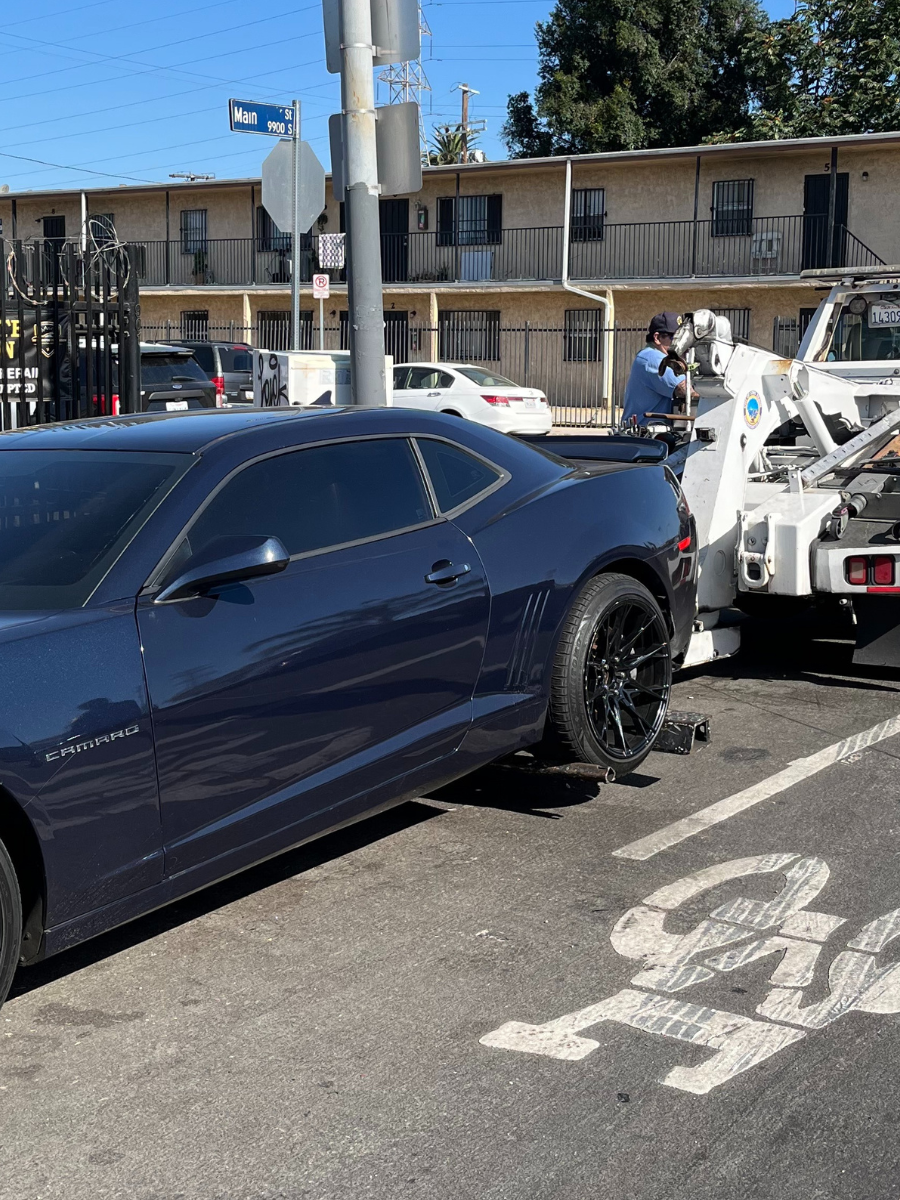 Police seize cars, arrest 2 men after chaotic street takeover that ended in looting