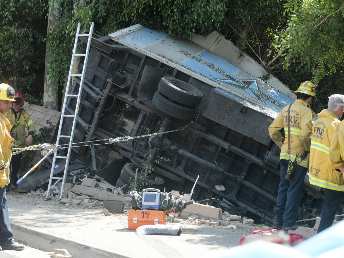 Man charged with manslaughter in crash that sent truck careening through wall