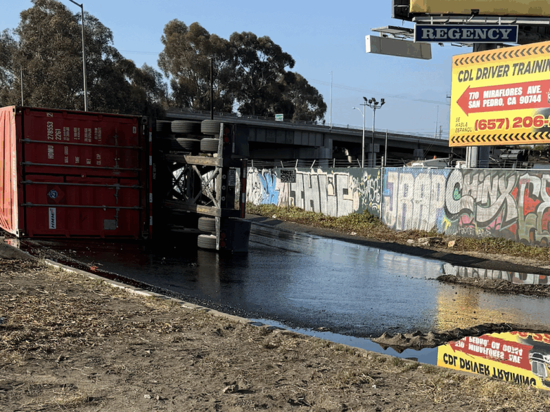 Tipped-over truck spills thousands of gallons of oil onto 710 Freeway in Long Beach