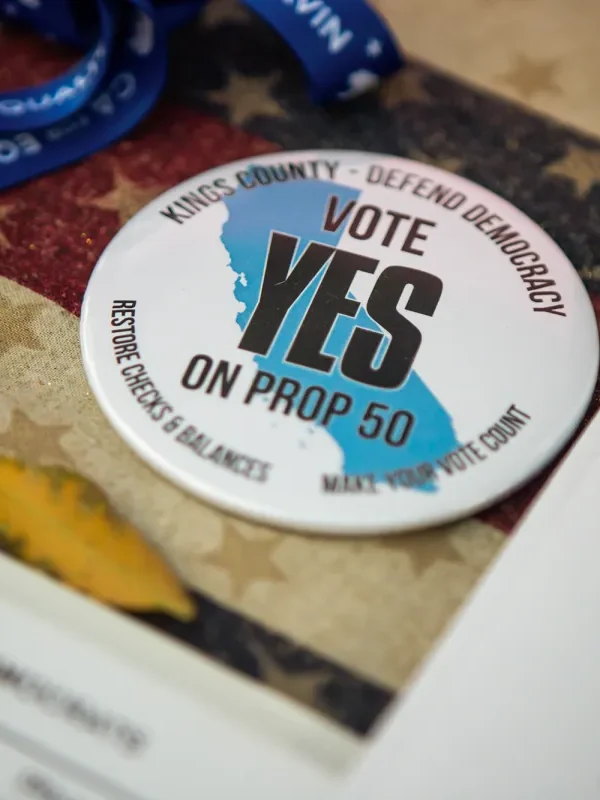 Supporters are way ahead in fundraising for Newsom’s Prop. 50, but the race remains close