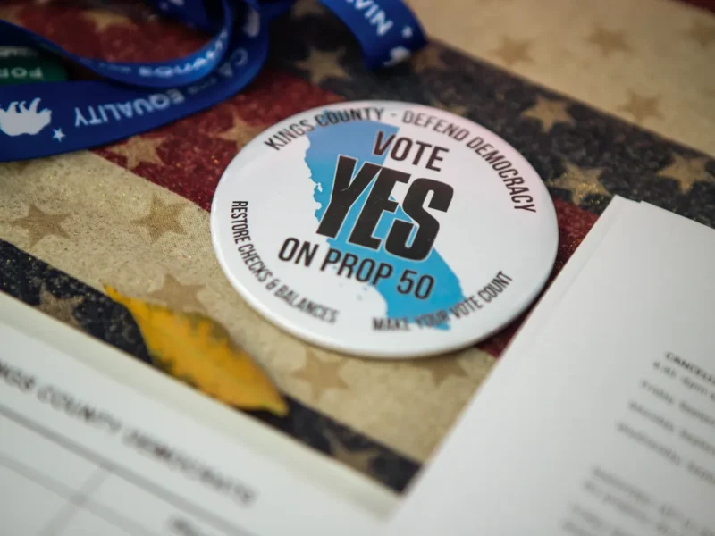 Supporters are way ahead in fundraising for Newsom’s Prop. 50, but the race remains close