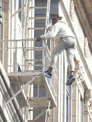 Assault suspect dangles from fire escape on 11th floor of Long Beach office building