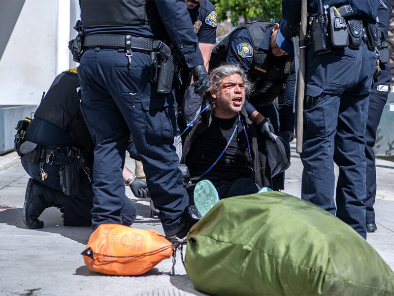 Man attacks police officer with a rock in downtown Long Beach, witness says