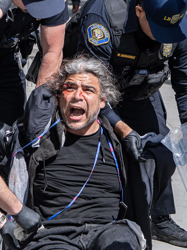 Man charged with trying to murder police officer argues with judge at first court hearing