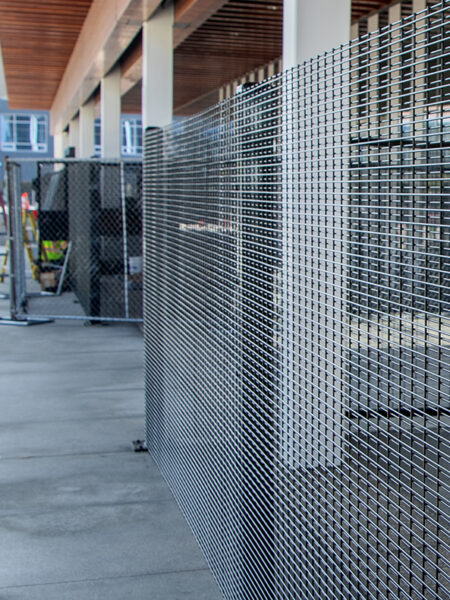 Long Beach built a fence around its library. A homelessness committee says it’s a waste.