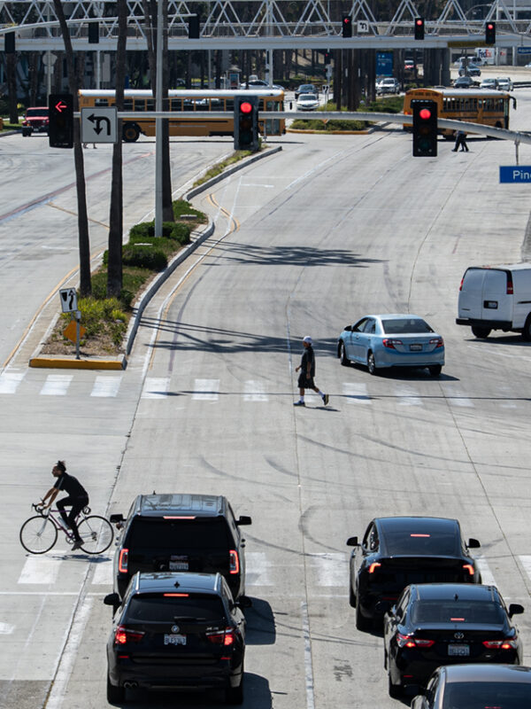 With police writing far fewer tickets, drivers are running red lights with impunity, residents say