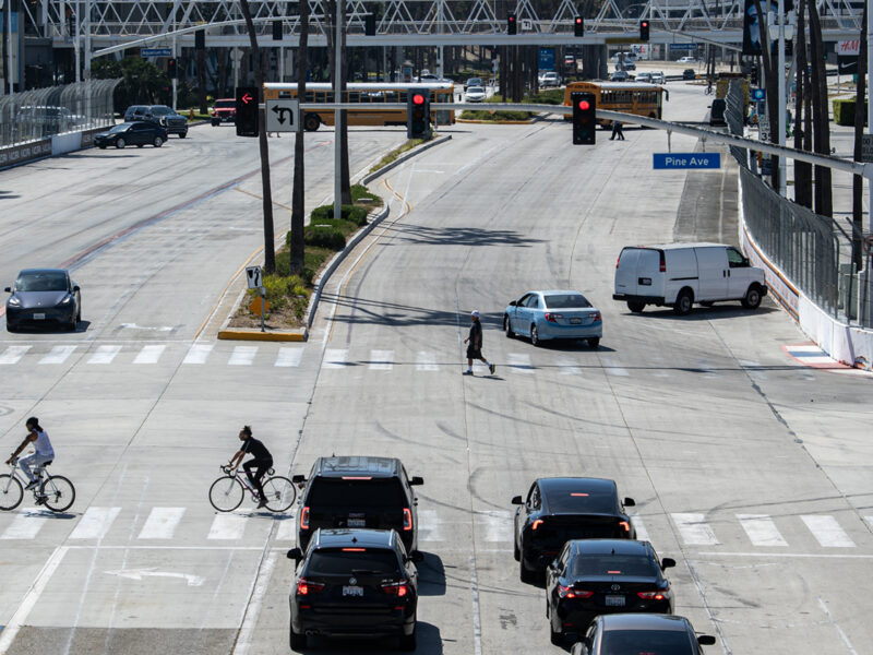 With police writing far fewer tickets, drivers are running red lights with impunity, residents say