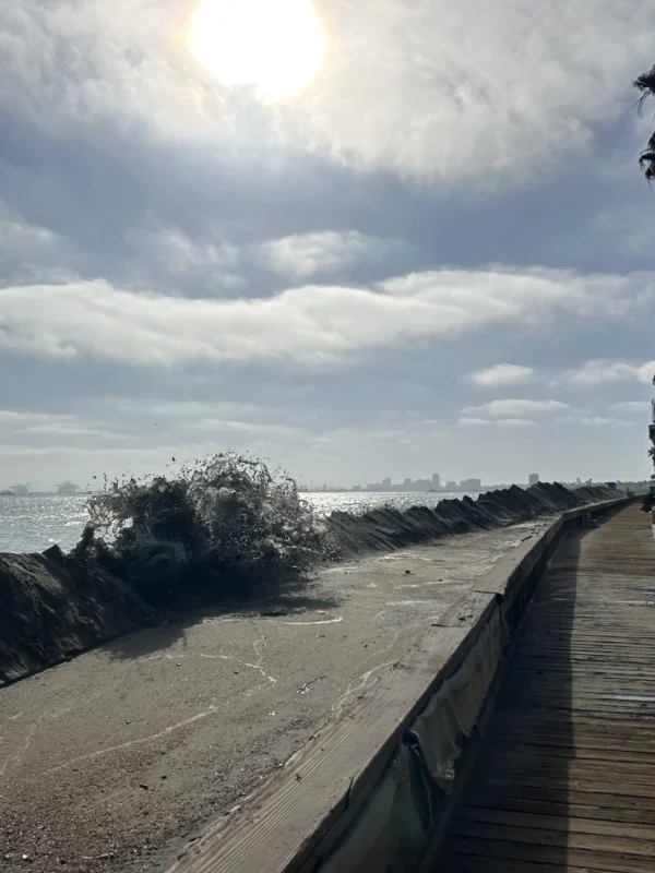High tides provide glimpse into rising sea levels. A Long Beach neighborhood is on the front lines