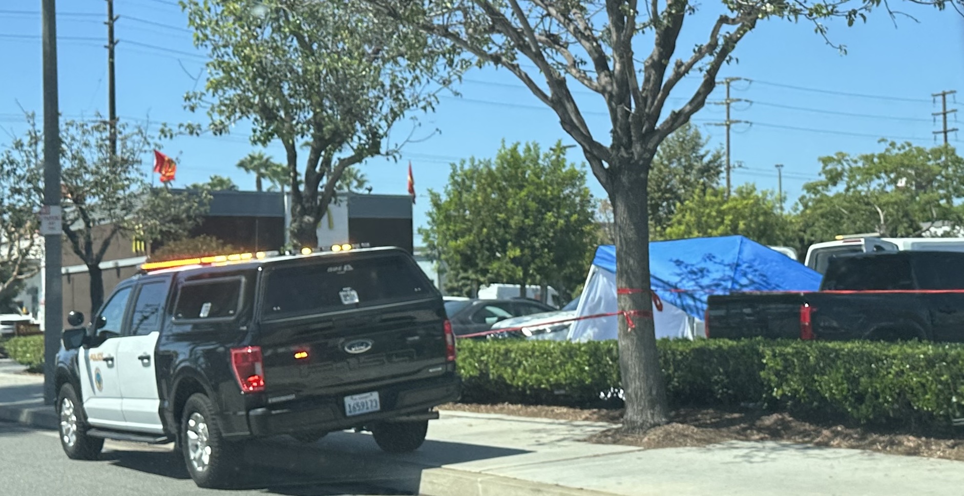 Woman's body found in car in Long Beach shopping center. No foul play suspected, police say