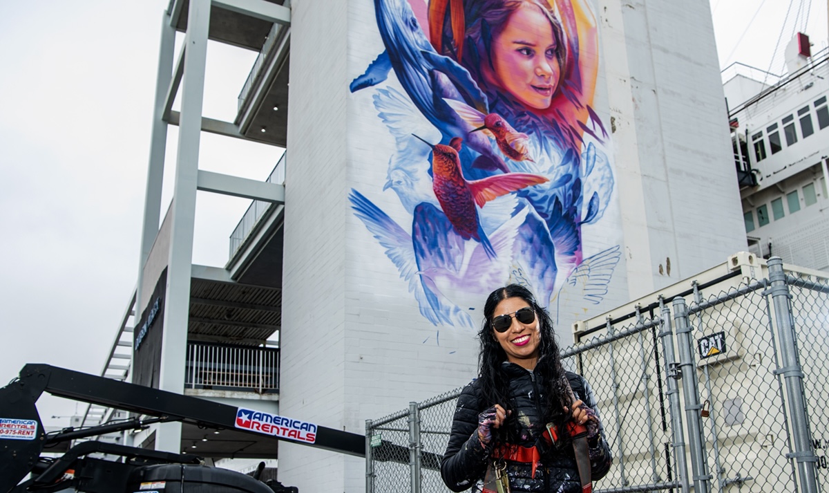 The story and artist behind an enormous new mural next to the Queen ...