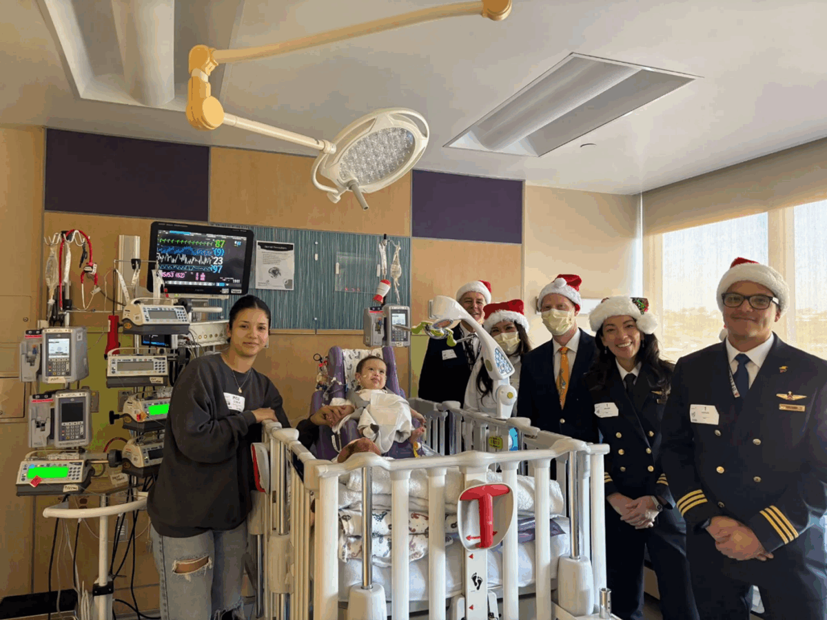 Pilots for Kids make spirits soar during holiday visit, helping Miller Children’s & Women’s Hospital patients prepare for the new year